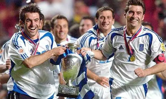 greec trophy Smiles all around from Karagounis and Zagorakis following their triumph